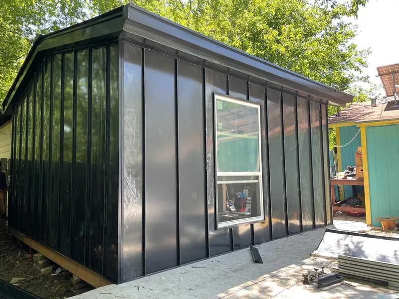 Black standing seam metal wall panels for Roof Inspection in Cypress Lake